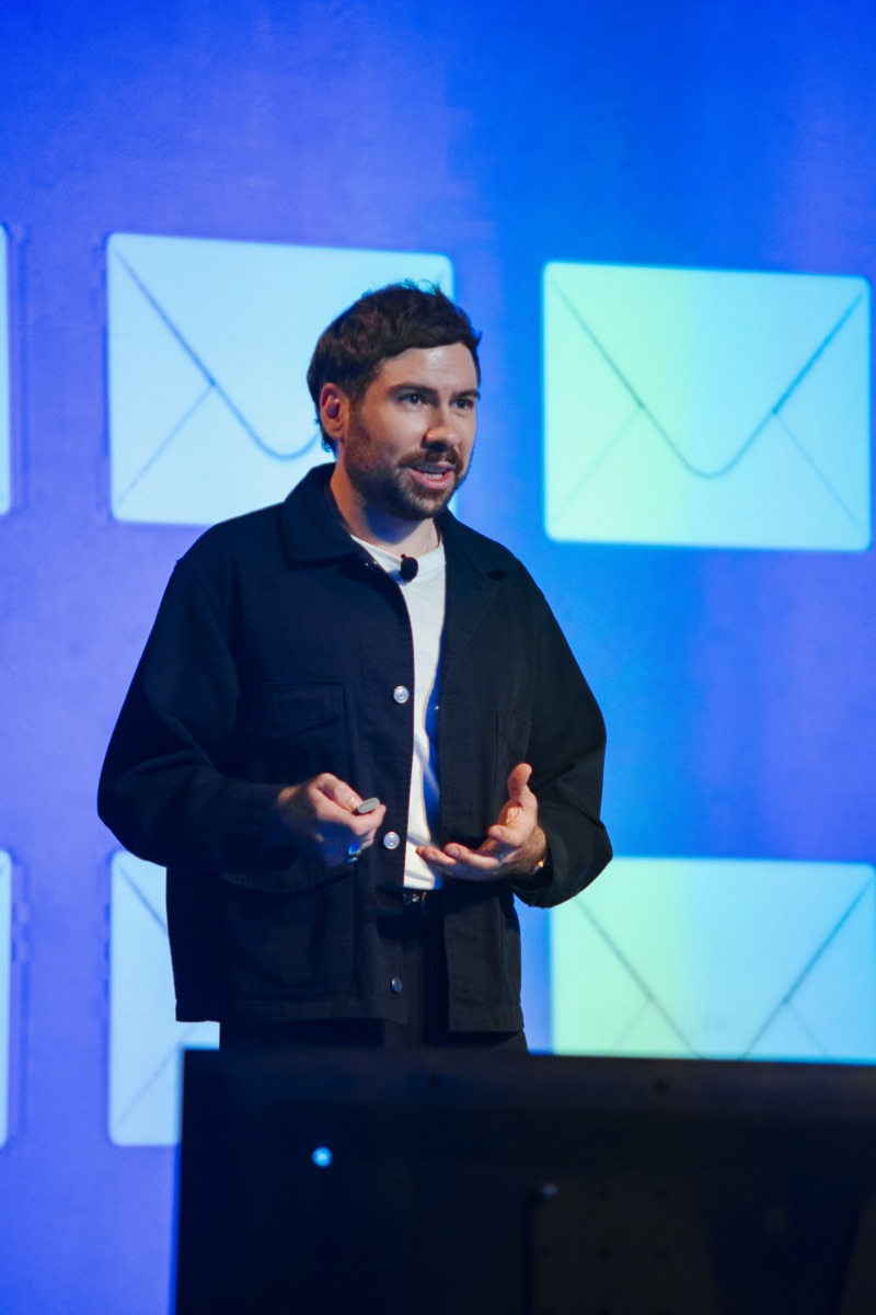 Andrew Mattock presenting on the RevFest stage