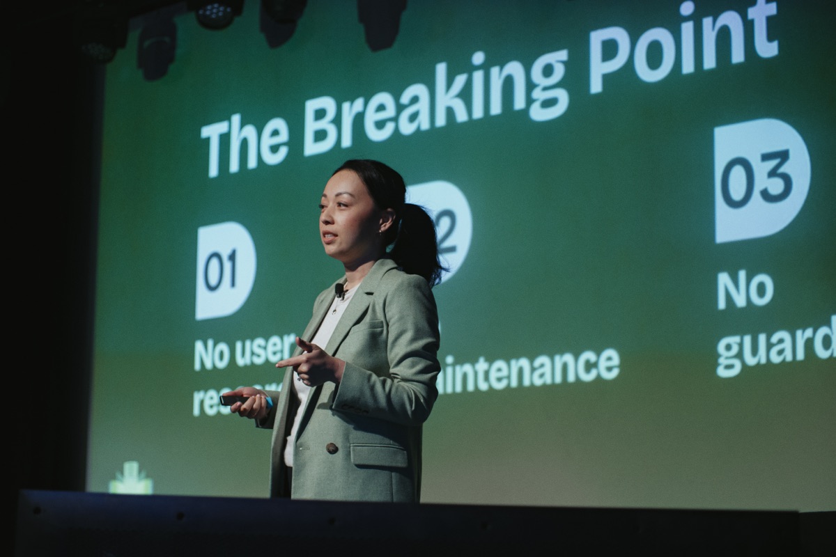 Christine Hou presenting on the RevFest stage