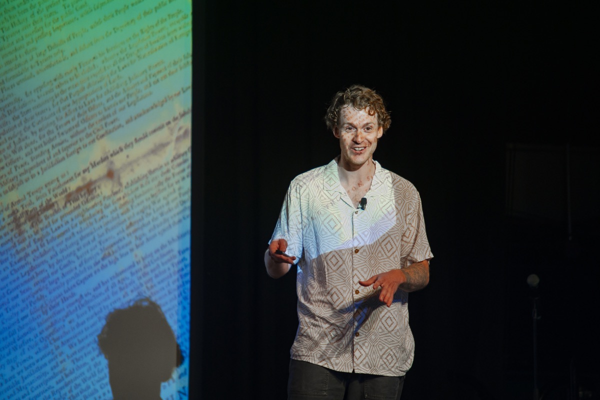 Kyle Ketchum presenting on the RevFest stage